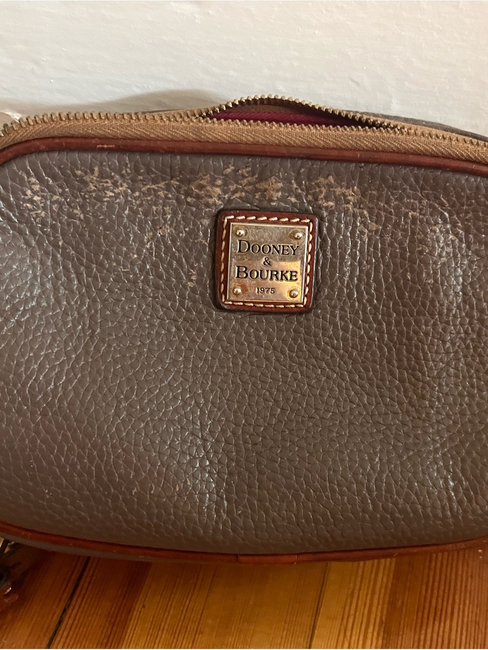 Dooney & Bourke Taupe Pebbled Leather Crossbody with Brass Plaque